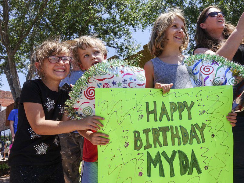 Joyful parade fulfills two wishes
